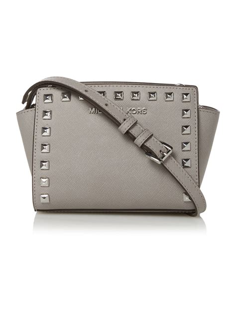 michael kors crossbody bag grey rivets|Michael Kors Crossbody bag.